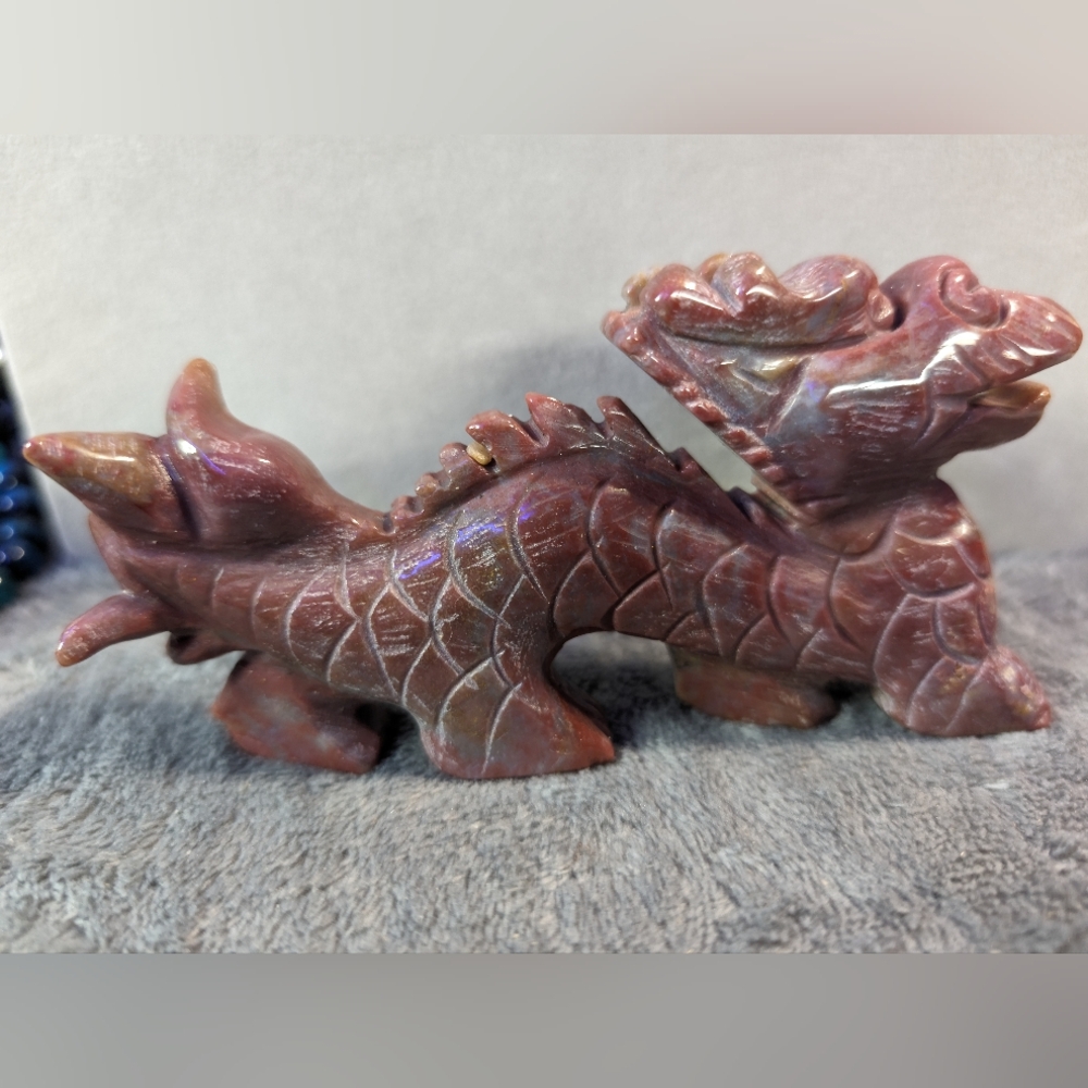 Red moss agate dragon sculpture